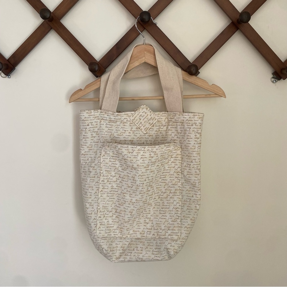Elegant Cream Tote Bag Hand-sewn Lined snap closure